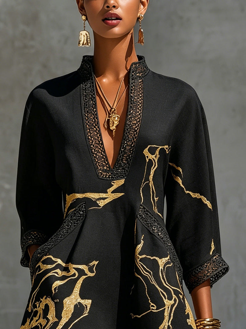 Léonie | Mini-robe en dentelle crochetée noire à motifs dorés et décolleté en V